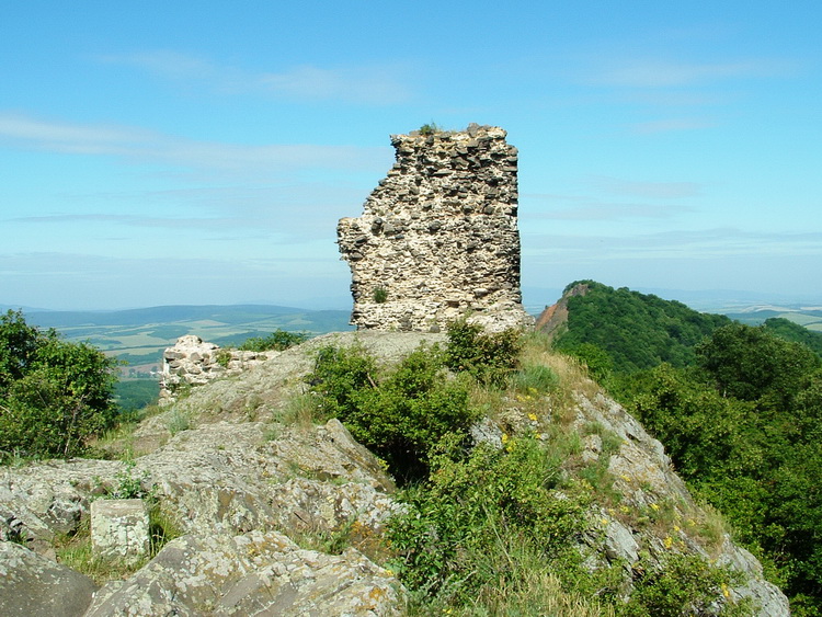 The ruins of Szandavár Castle on the top of the mountain