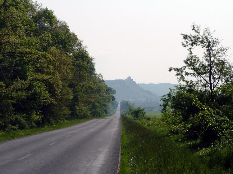 The Castle of Sümeg stands at the end of the straight road