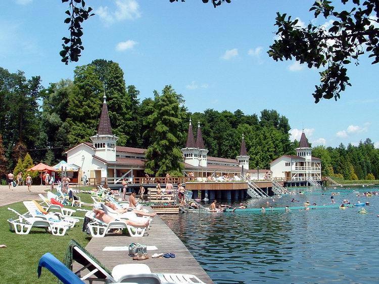 The buildings of the bath stand partly in the water