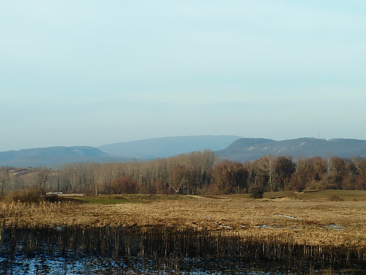 When we leave the forest, we glance the hills of Gerecse