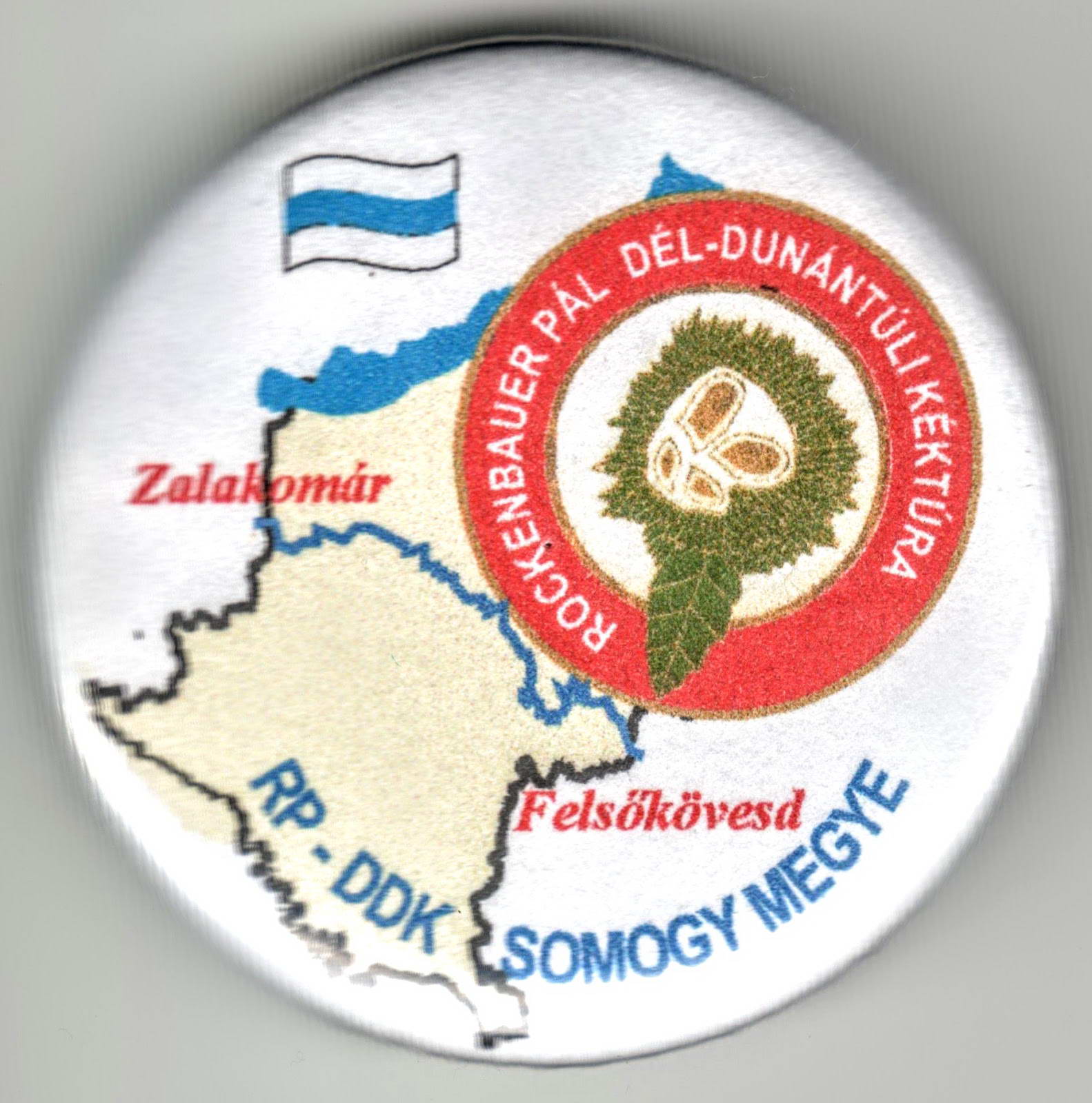 A Rockenbauer Pál Dél-dunántúli Kéktúra Somogy megyei szakaszjelvénye - A kép megnyitásához kattints ide!